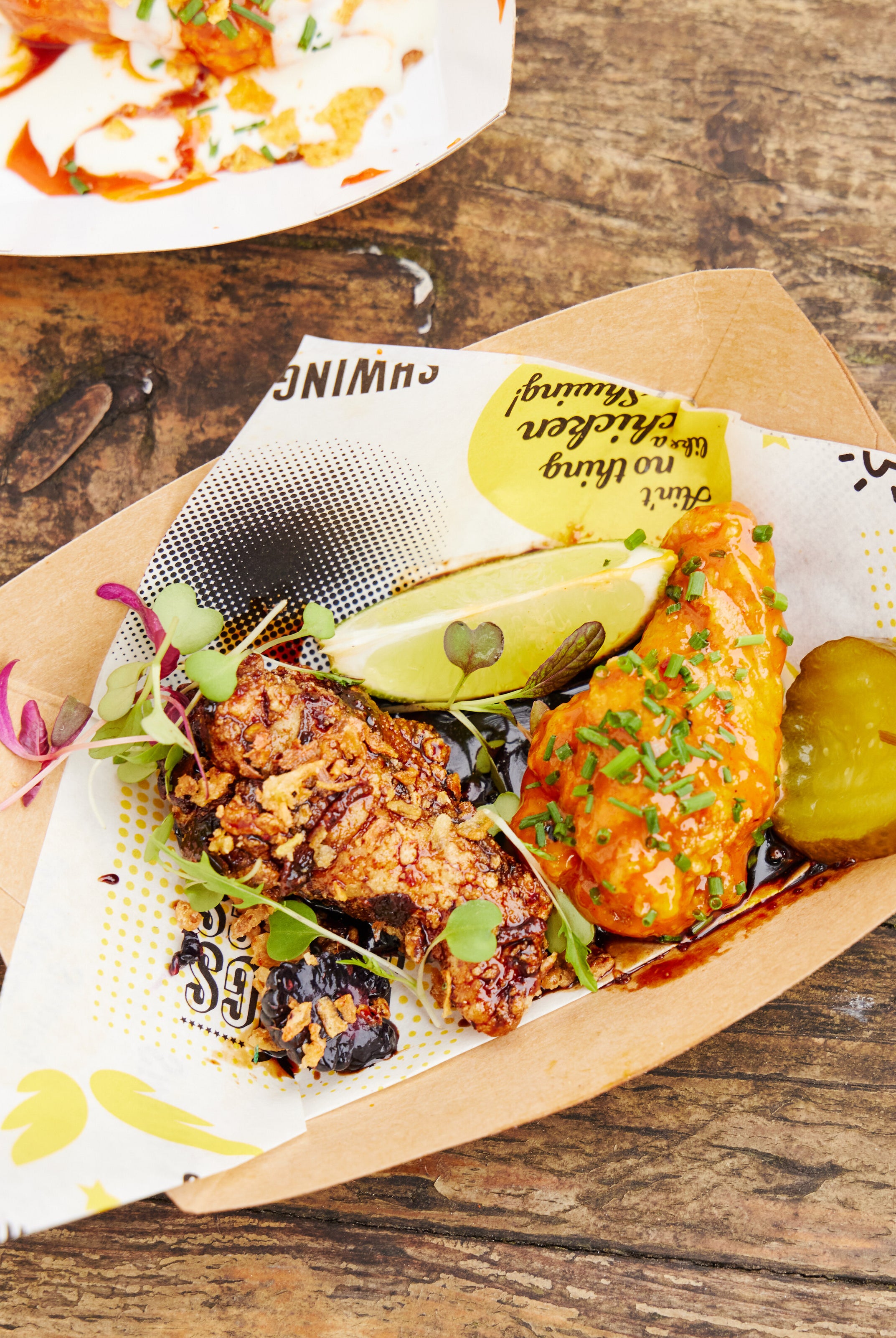 award winning wings from Shwings at wingjam London's best wings event, WingJam London Where Friends Feast on the Best Chicken Wings, WingJam London A Fun and Flavor-Packed Festival, WingJam London People Relishing Every Wing Bite Together, WingJam London A Celebration of Delicious Wings and Friendship