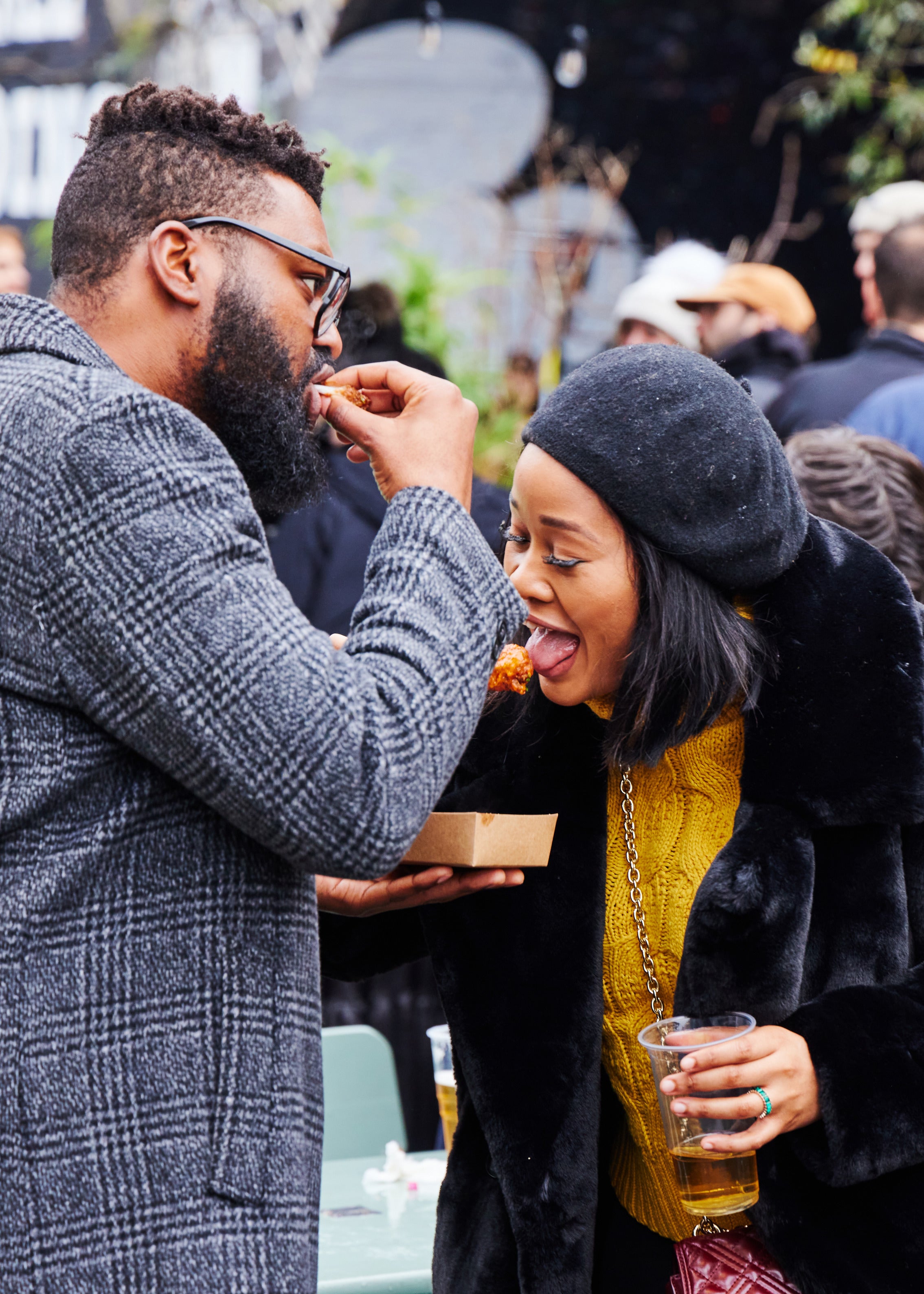 a couple eats delicious wings at wingjam , WingJam London The Ultimate Place to Enjoy Chicken Wings, WingJam London A Celebration of Delicious Wings and Good Times, WingJam London Where Friends Come Together Over Flavorful Wings, WingJam London A Fun Event for Wing Lovers and Friends