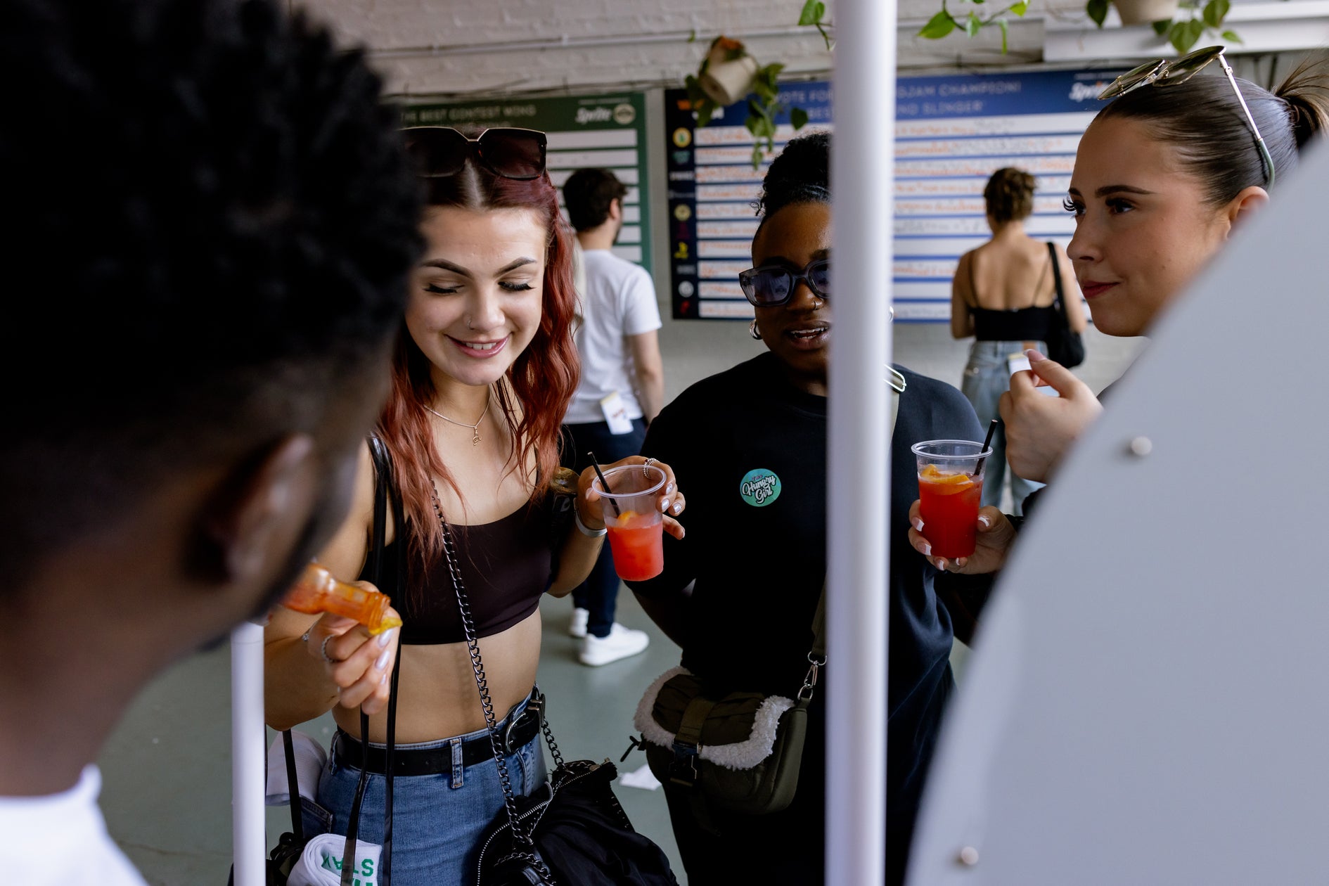 encona's sauce tasting at wingjam 2024, WingJam London Where Friends Feast on the Best Chicken Wings, WingJam London A Festival for Foodies and Friends, WingJam London The Ultimate Chicken Wing Experience, WingJam London People Relishing the Best Wings Together, WingJam London A Fun Gathering for Wing Fans