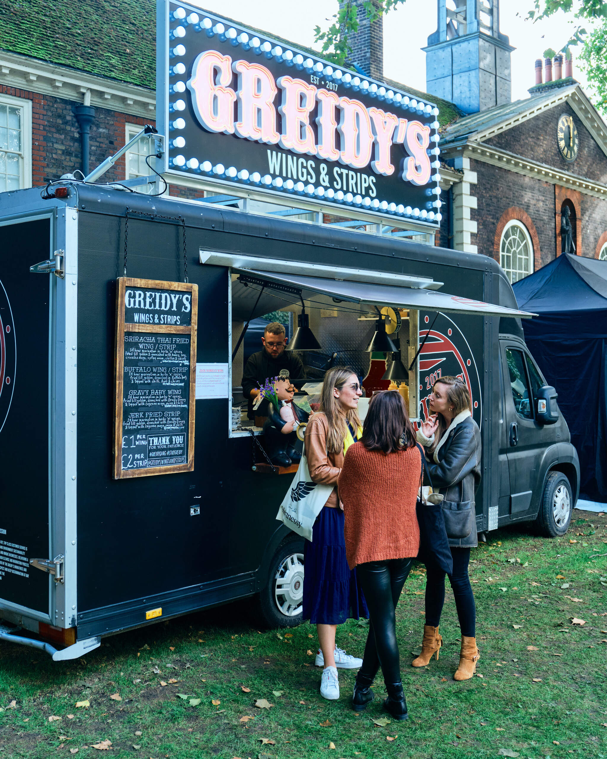 greidy's food truck at wingjam , WingJam London The Ultimate Chicken Wing Festival Experience, WingJam London Friends Savoring the Festival’s Best Wings, WingJam London Where People Come Together for Chicken Wings, WingJam London A Flavorful Festival for Chicken Wing Lovers, WingJam London Friends Loving the Festival’s Delicious Wings