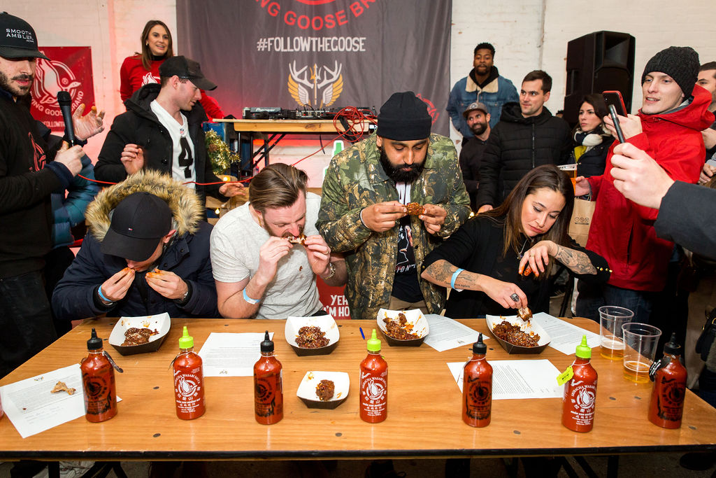 hot wing contest at wingjam, London Chicken Wing Extravaganza WingJam, Attendees Loving WingJam’s Chicken Wings, WingJam London Enjoyment for Foodies, WingJam London A Celebration of Chicken Wings